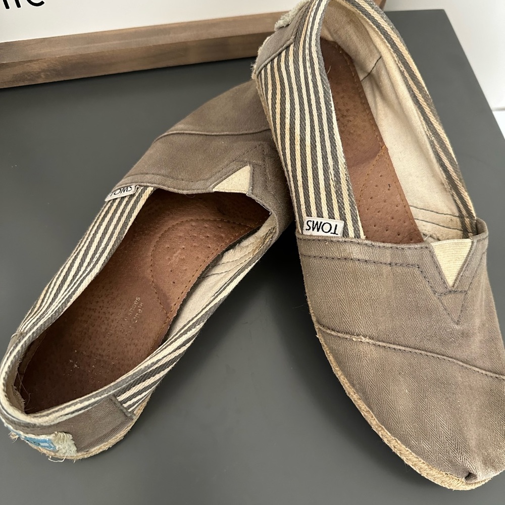 Gray and striped TOMS